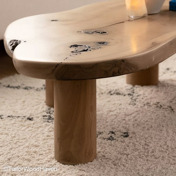 Raw edge wood slab coffee table made from solid wood with a raw edge and smooth top, this table balances natural texture with refined finish