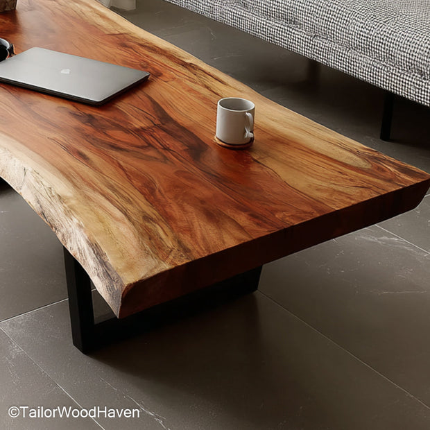 Narrow live edge coffee table crafted from long slender wood slabs with exposed grain and raw edge, ideal for small spaces or hallway setups