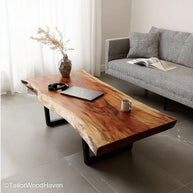 Narrow live edge coffee table crafted from long slender wood slabs with exposed grain and raw edge, ideal for small spaces or hallway setups